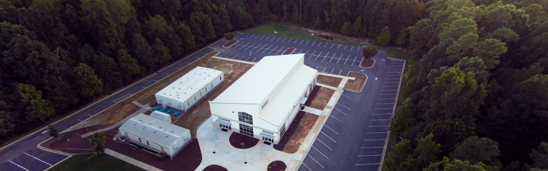 Triangle Community Church pre-engineered metal building campus with standing-seam roofs